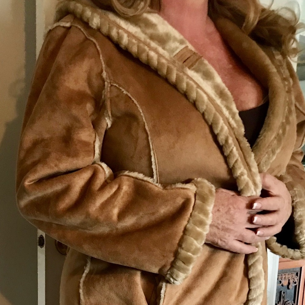 Long cozy winter jacket. Hardly used in Florida